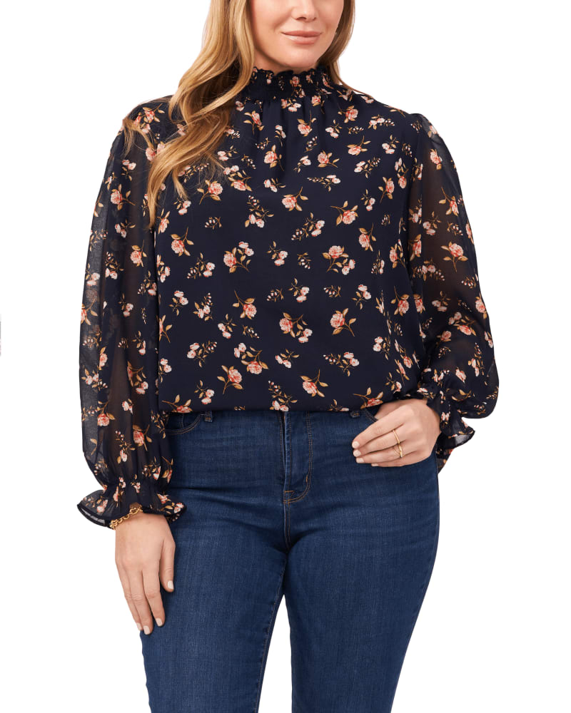 Front of a model wearing a size 0X Lucille Smock Neck Blouse in FLRL TWLGHT BLU by 1.State. | dia_product_style_image_id:262429